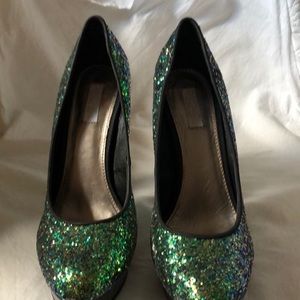 Multi color glitter shoes.